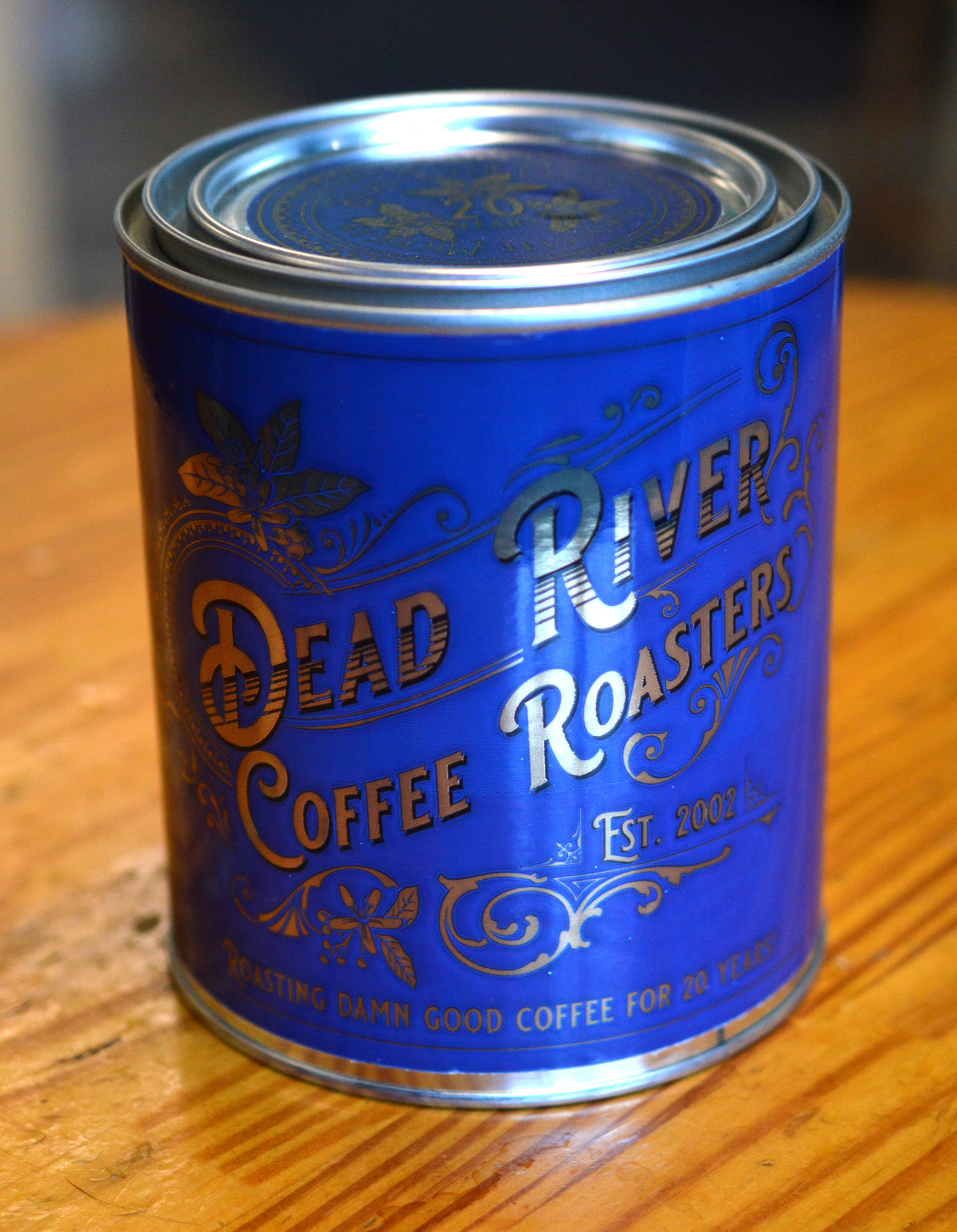 Commemorative tin and coffee dead river coffee roasters